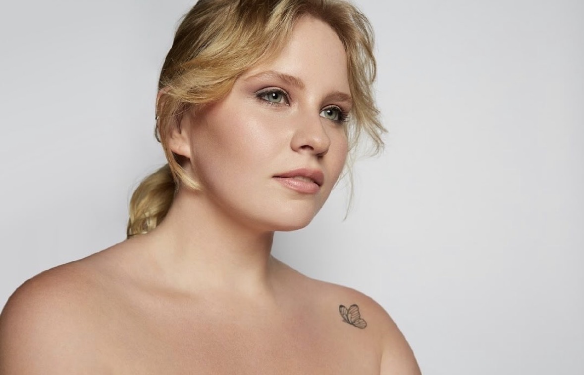 Soft bridal beauty — natural glow with tousled blonde updo