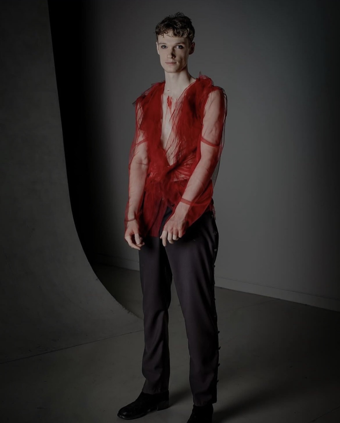Editorial portrait — red tulle with soft beauty