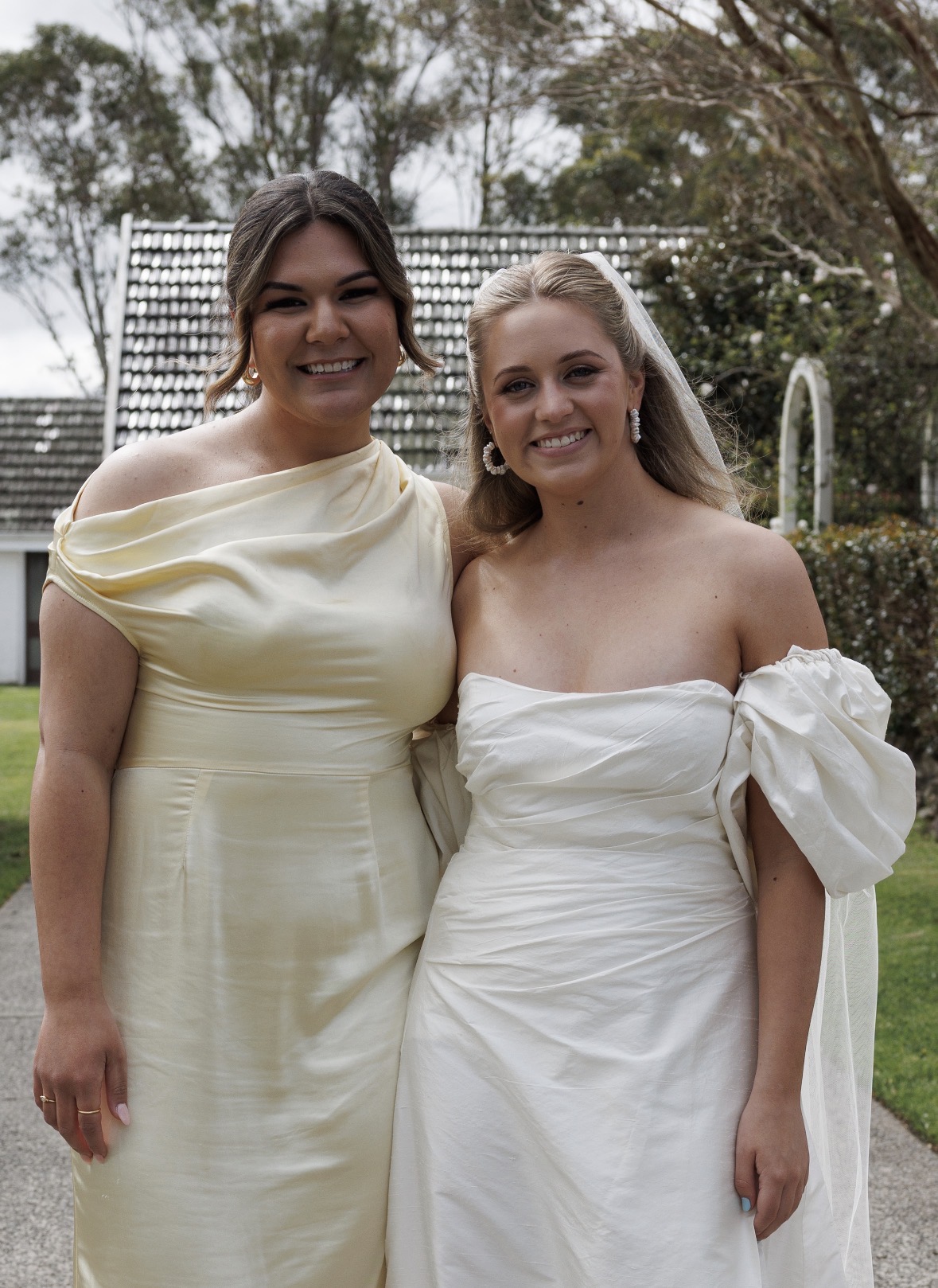 Bride and bridesmaid — soft glam wedding day