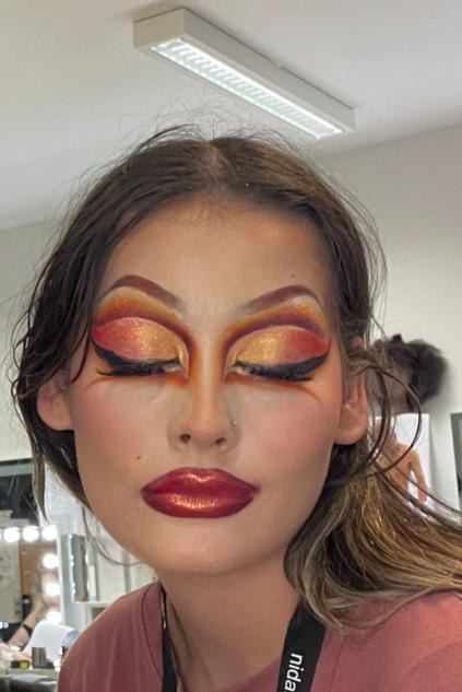 Dramatic orange and red eye with red lip