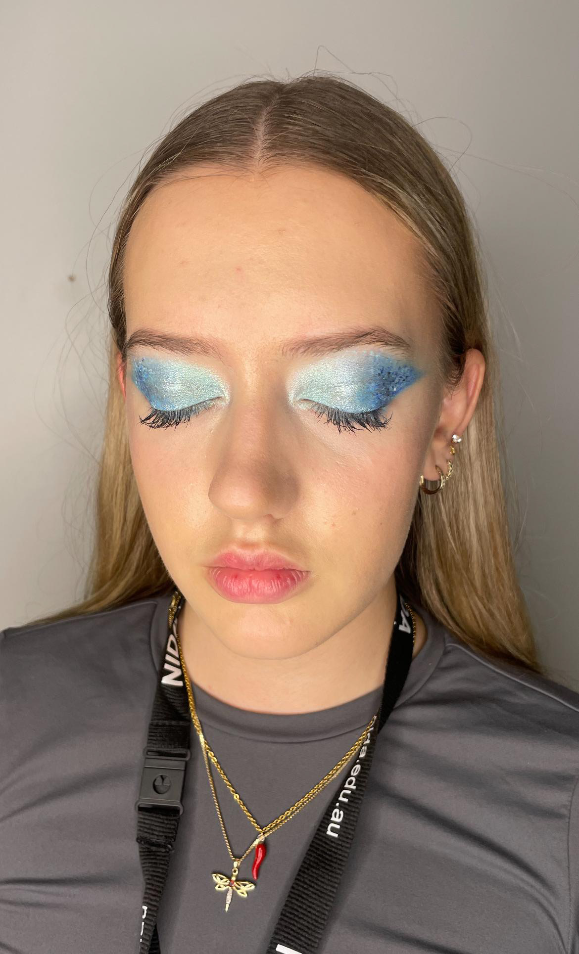 Green glitter eye with winged liner