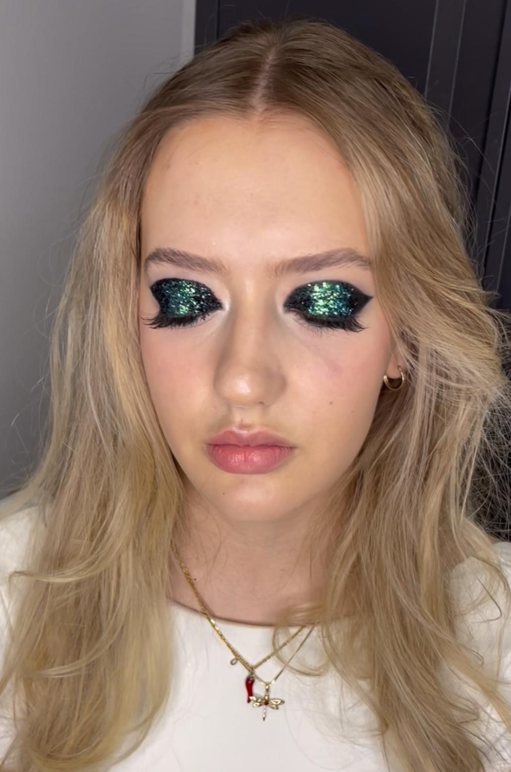 Pink eyeshadow and glossy lip